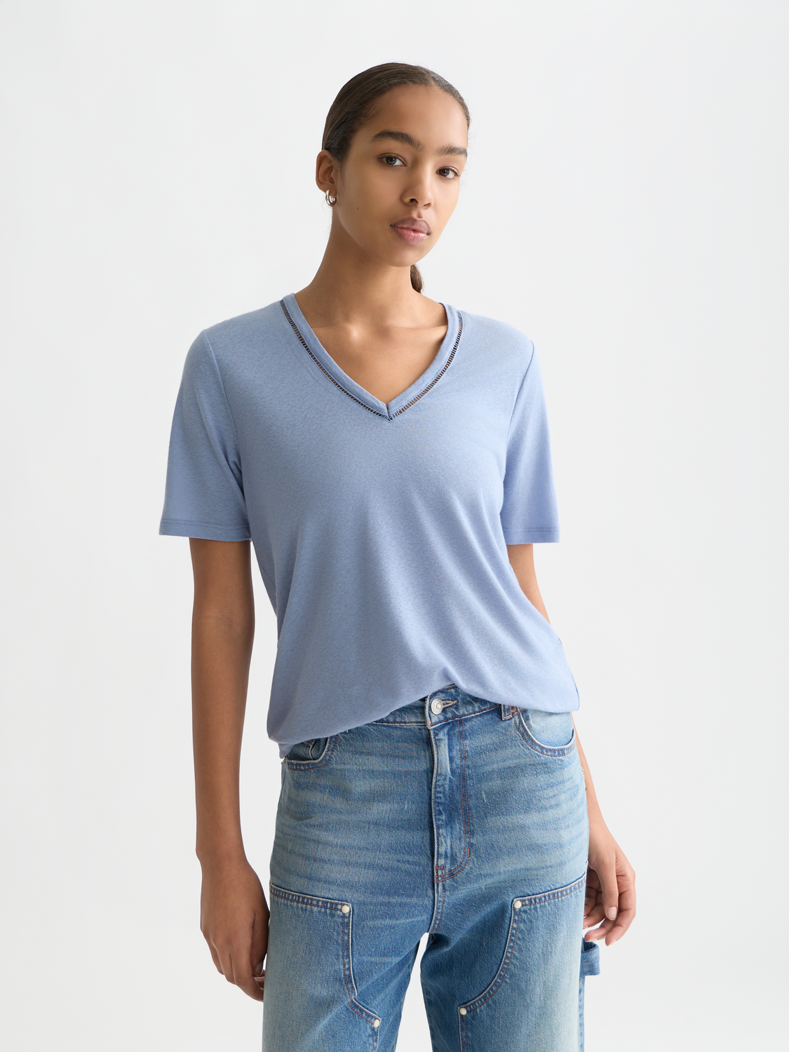 Linen V-neck T-shirt by Scotch & Soda, short sleeve tee in light fabric, displayed on a model.
