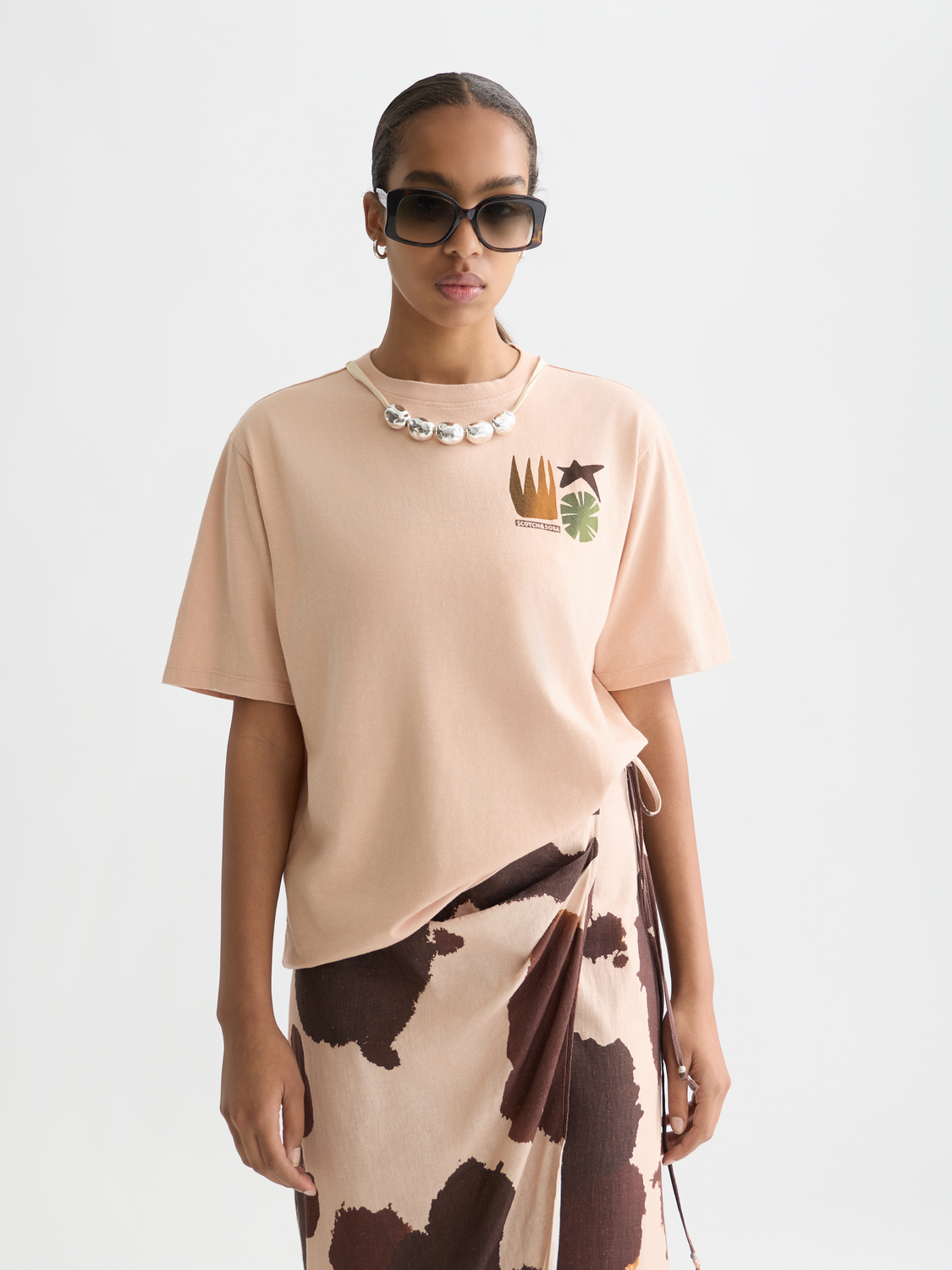 Short sleeve Scotch & Soda artwork t-shirt featuring a colorful printed design on the front.