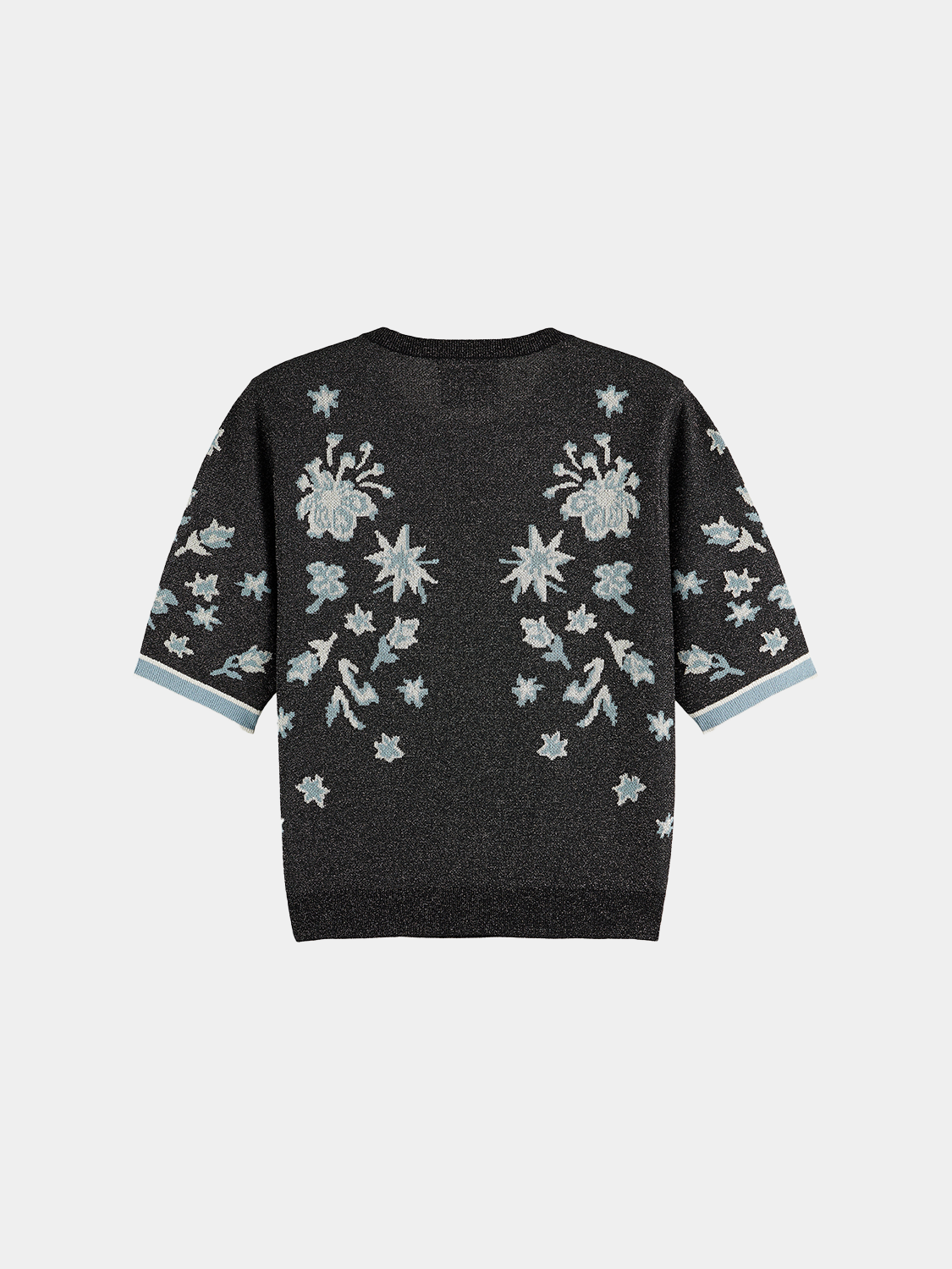 Black jacquard short-sleeved knitwear top by Scotch & Soda, shown from the back with detailed woven pattern.