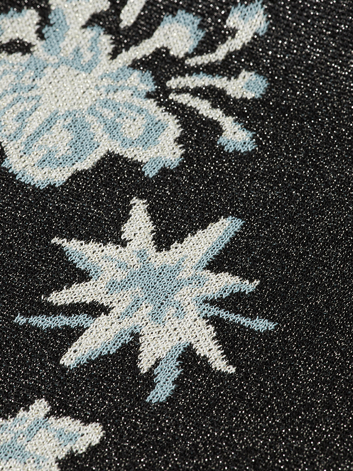 Light blue Scotch & Soda jacquard short-sleeved knit top with intricate pattern, displayed flat on a white background.