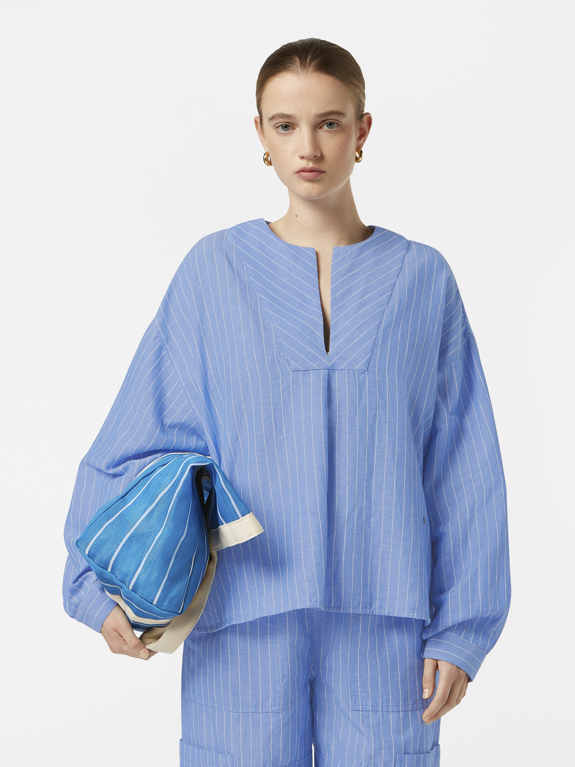 Striped cotton-linen woven blouse by Scotch & Soda, featuring a relaxed fit and classic pattern.