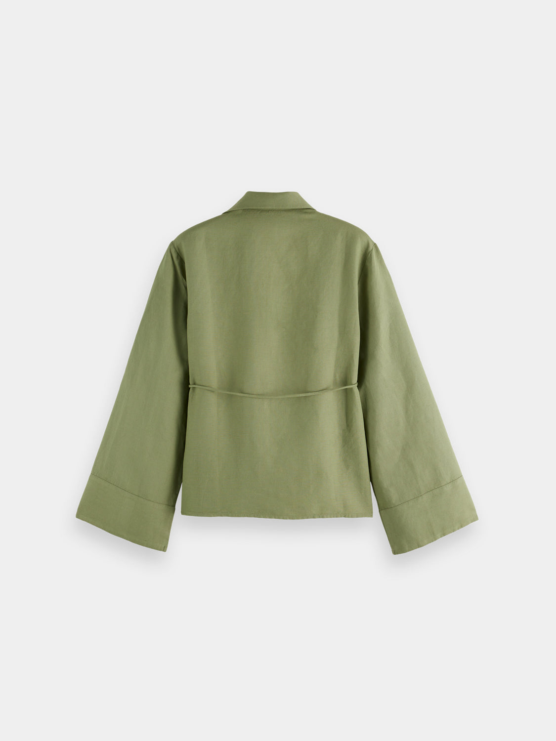Long sleeve wrap shirt by Scotch & Soda, featuring a stylish design and button details, displayed on a hanger.