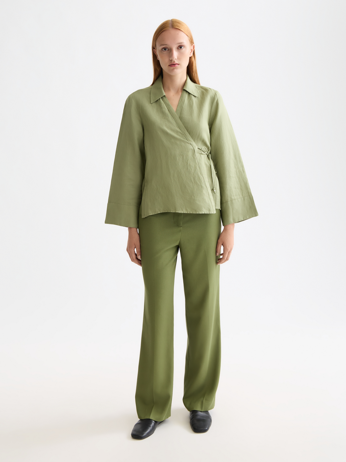 Long sleeve wrap shirt by Scotch & Soda featuring a stylish, fitted design with a soft fabric and button details.