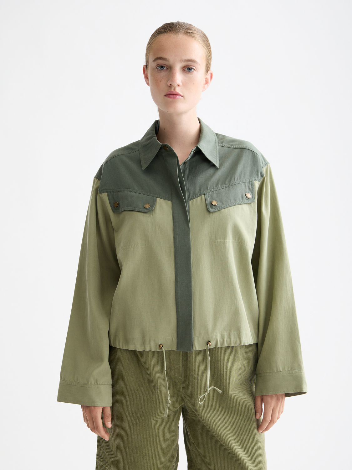 Long sleeve contrast color utility shirt by Scotch & Soda, featuring multiple pockets and a stylish casual design.