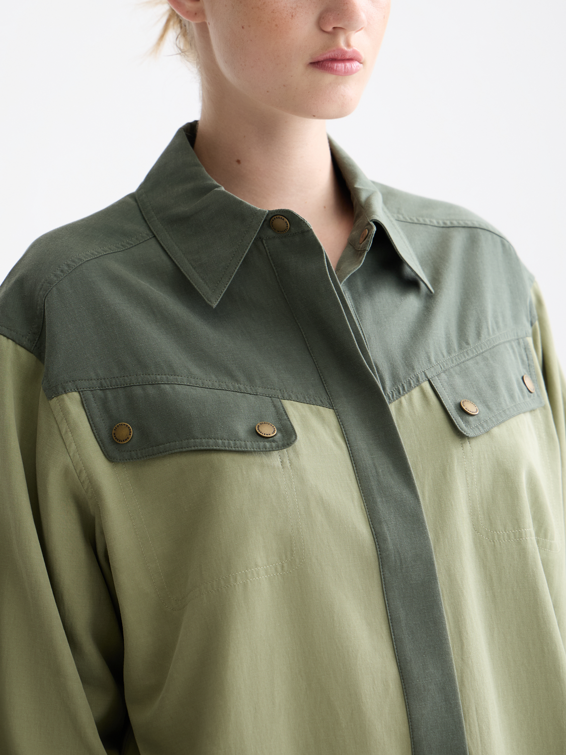 Long sleeve contrast color utility shirt by Scotch & Soda with multiple pockets and button-front design.