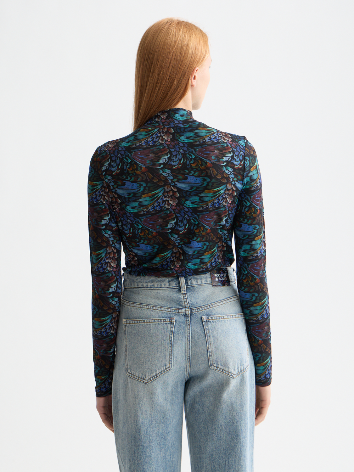 Black printed long-sleeve mock neck tee from Scotch & Soda with graphic design on the front.