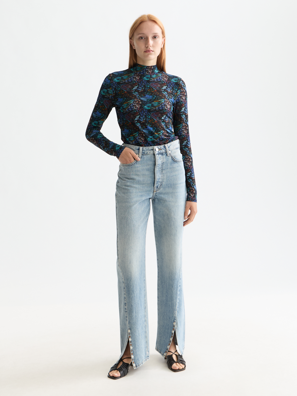 Long sleeve printed mock neck T-shirt by Scotch & Soda featuring a stylish design and fitted silhouette.