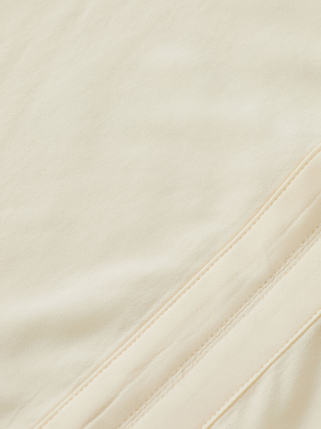 Woven draw string blouse from SCOTCH & SODA with long sleeves and relaxed fit, shown on a hanger.