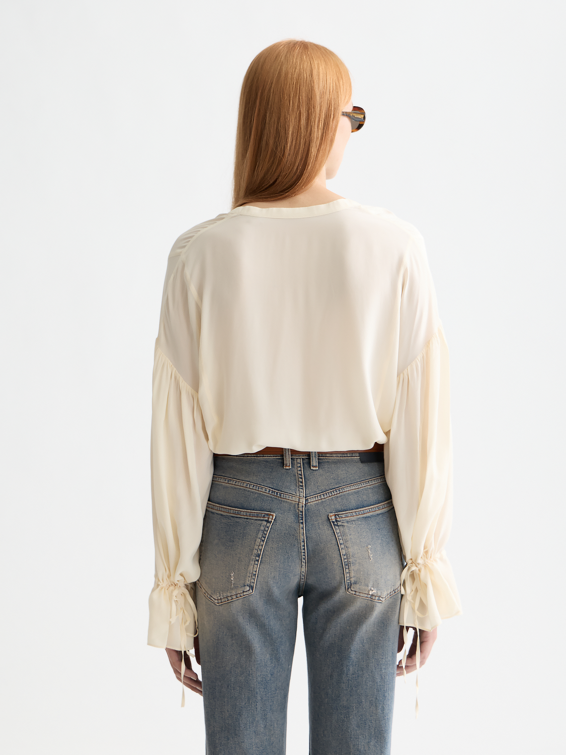 Woven Scotch & Soda drawstring blouse with long sleeves and relaxed fit, featuring a stylish neckline and casual design.