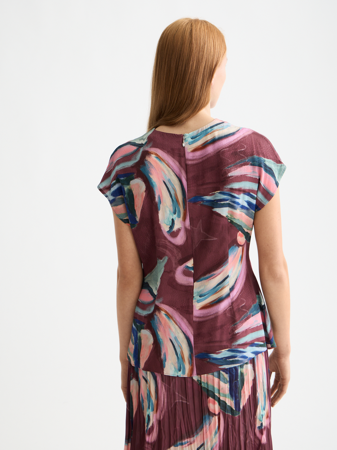 Black woven keyhole top by Scotch & Soda featuring a stylish cutout neckline and relaxed fit.