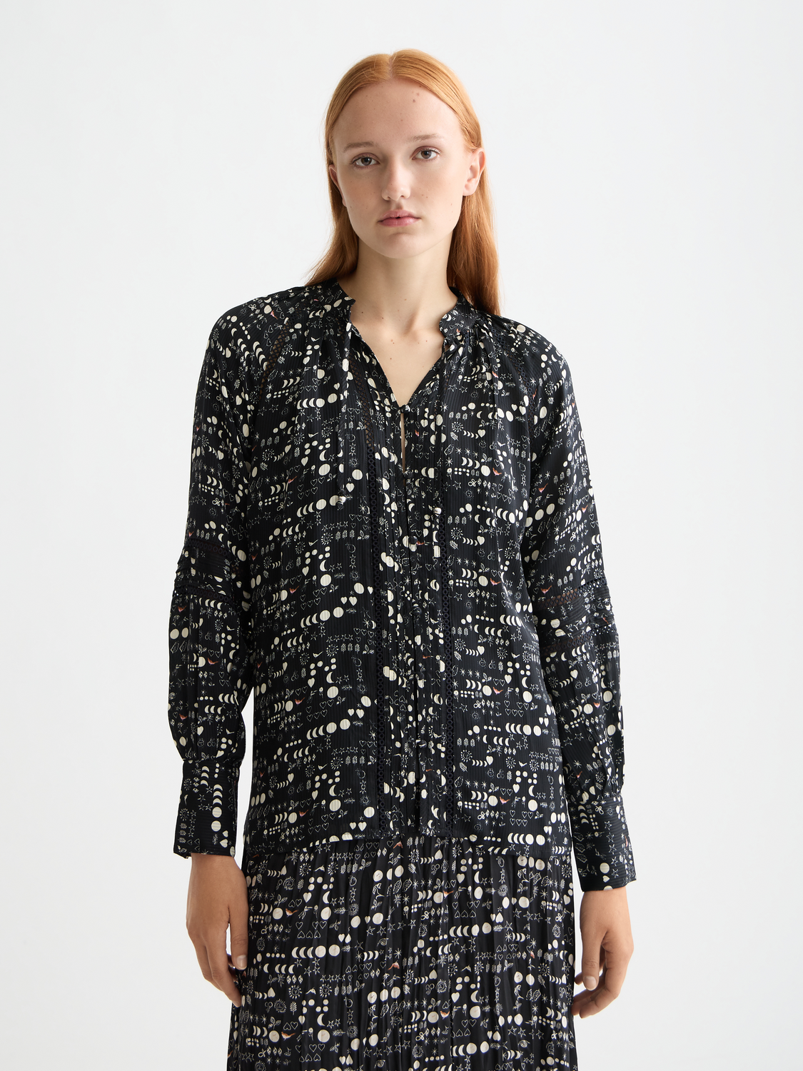Woven blouse with lace detail from Scotch & Soda, featuring a stylish, feminine design and intricate lace accents.