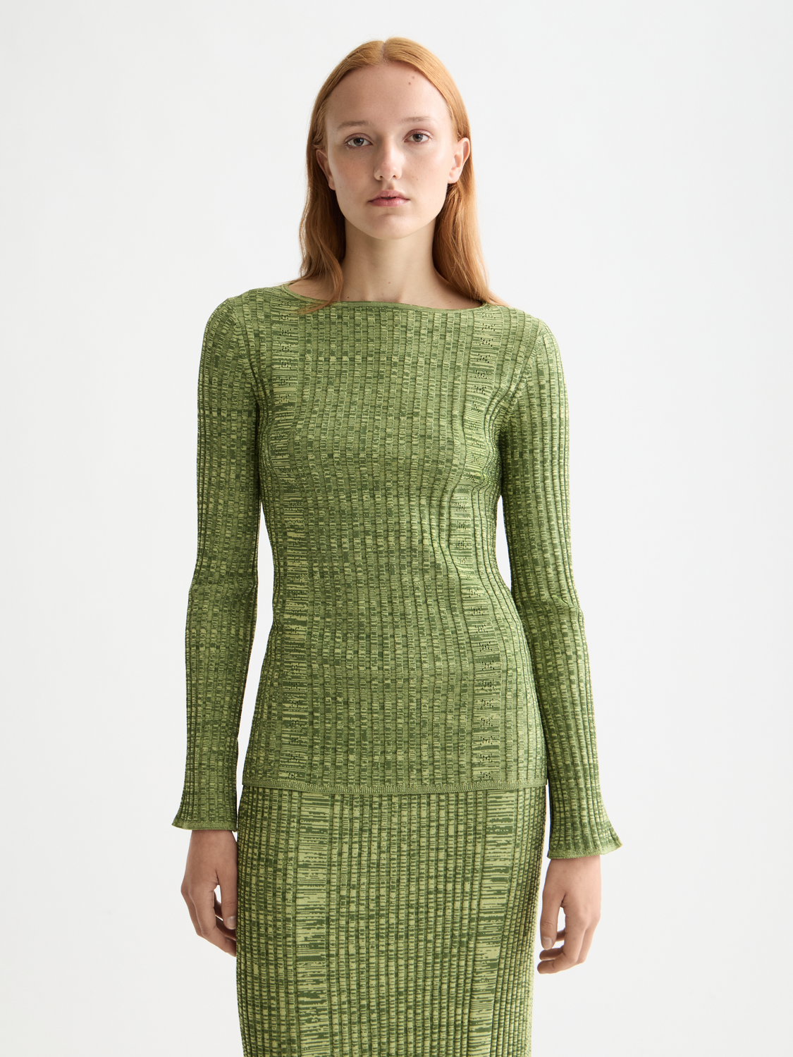 Ribbed knitted SCOTCH & SODA pullover featuring a close-up of the textured fabric and classic crew neck design.