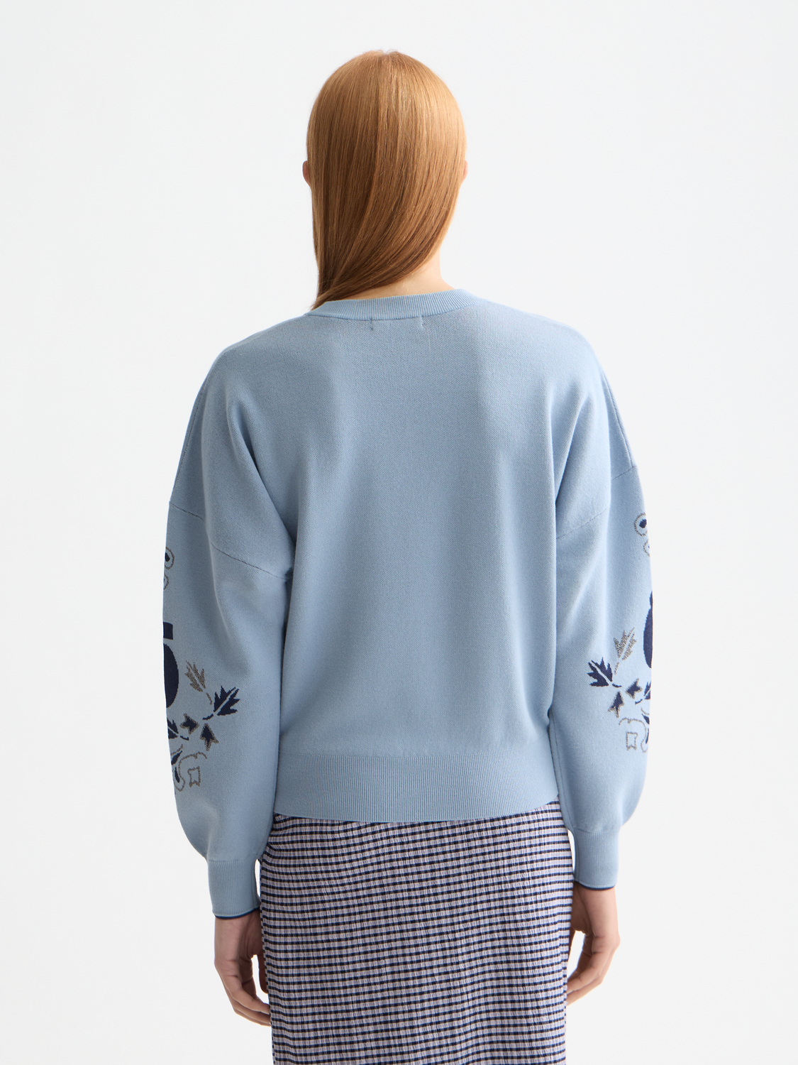 Black Scotch & Soda jacquard knitwear pullover featuring intricate patterns and a cozy, stylish fit.