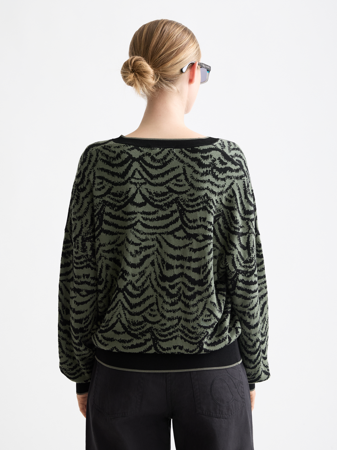Scotch & Soda jacquard v-neck pullover in knitwear, featuring intricate woven pattern and a classic v-neck design.