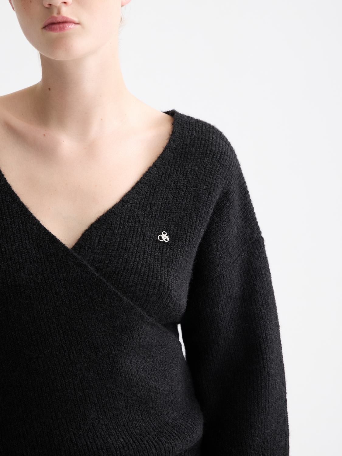 Fuzzy knit cardigan from Scotch & Soda with a cozy, textured appearance and relaxed fit, perfect for casual layering.