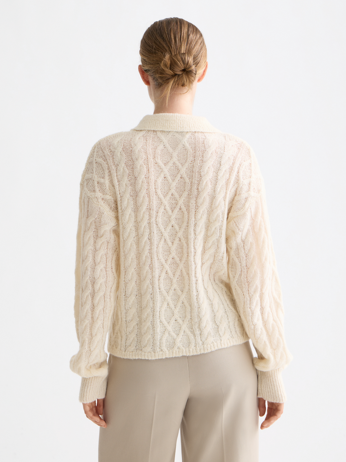 Scotch & Soda cable stitch polo pullover in knitwear featuring textured knit pattern and classic collar, front view.