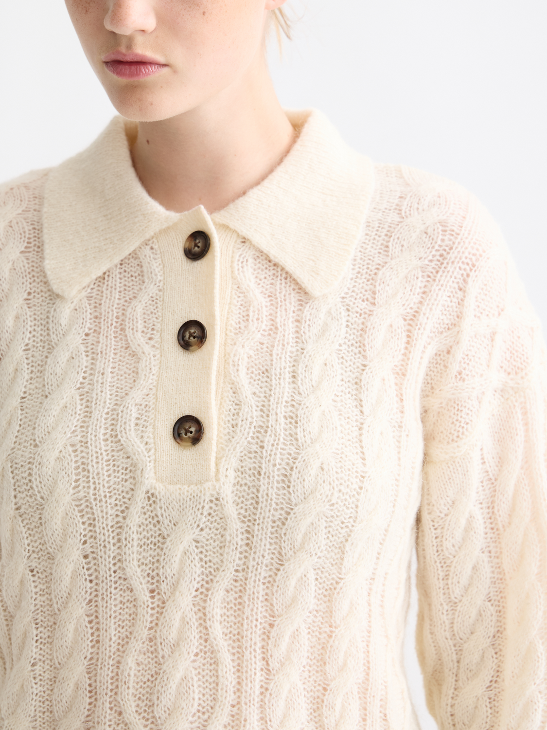 Gray cable stitch polo pullover by Scotch & Soda, knitwear featuring textured cable pattern and classic fit.