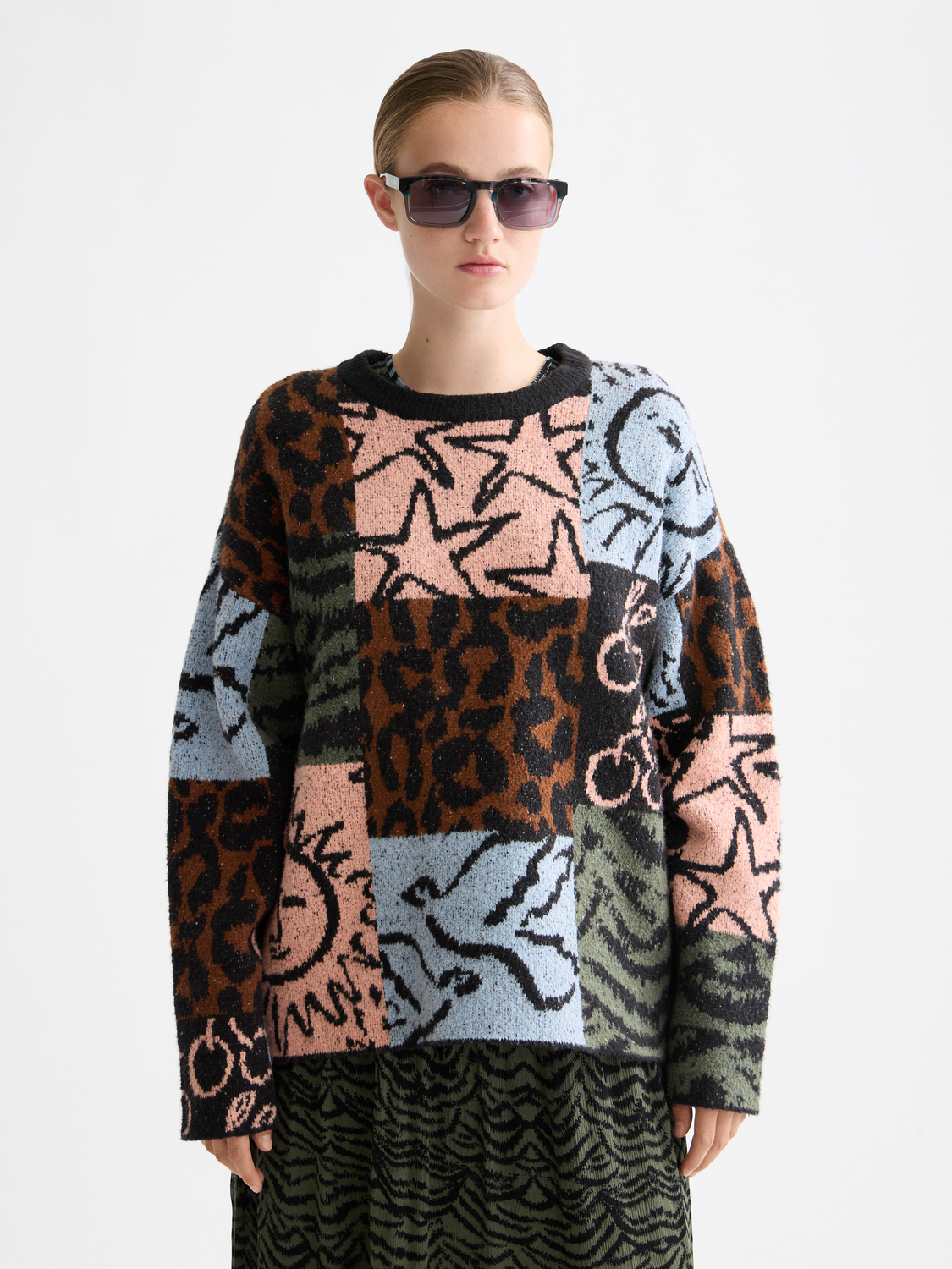 Jacquard oversized knit pullover by Scotch & Soda, featuring intricate pattern and cozy fit, shown in a natural color.