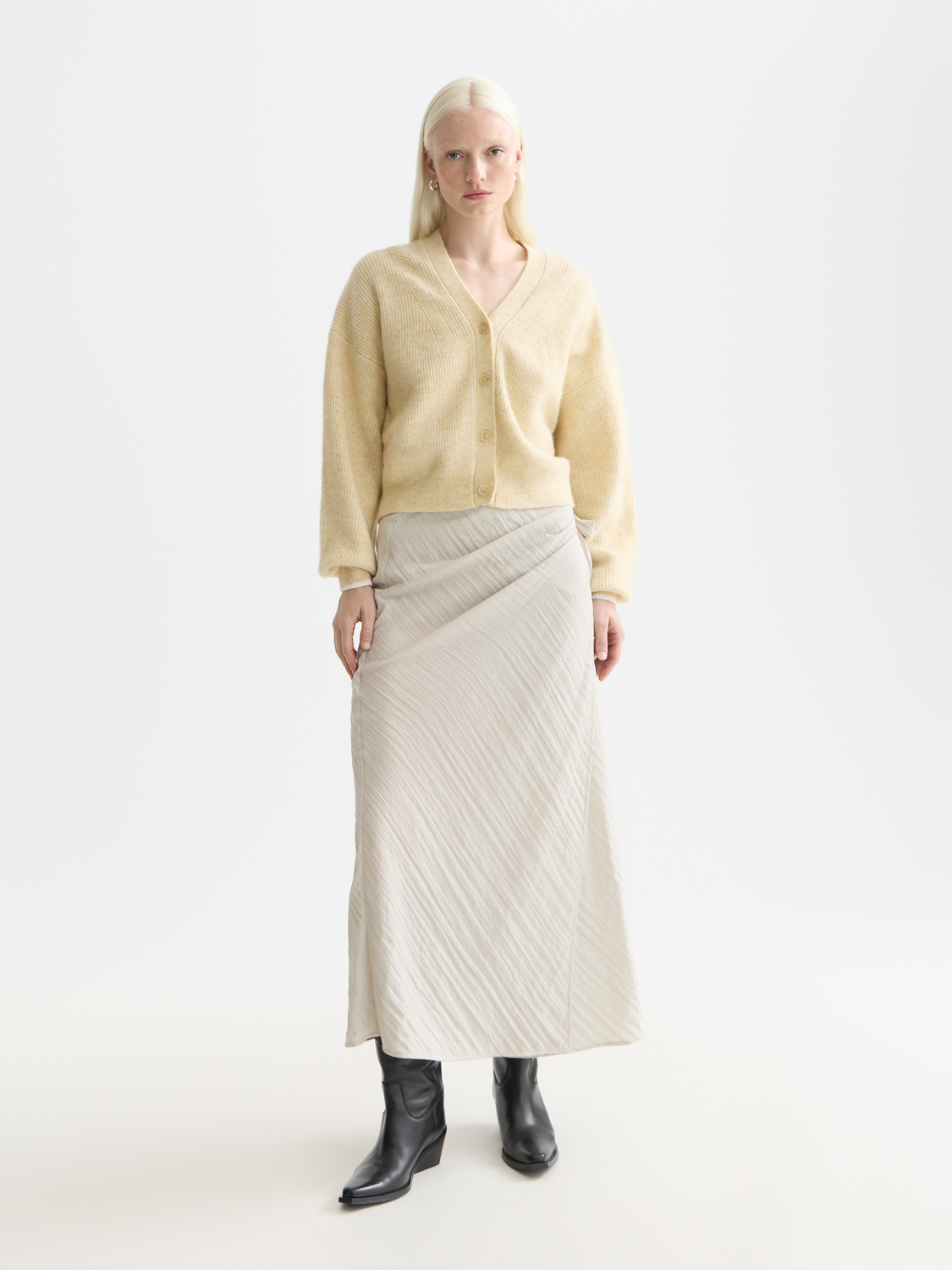 Fuzzy knit cardigan by Scotch & Soda with a cozy, textured appearance and front button closure, stylish and warm knitwear.