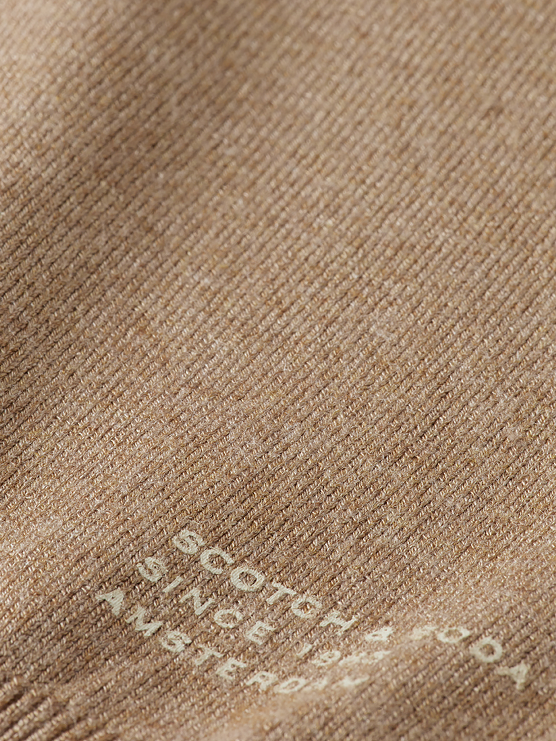 Relaxed-fit V-neck knit pullover by Scotch & Soda, showing soft, cozy fabric in a casual style.