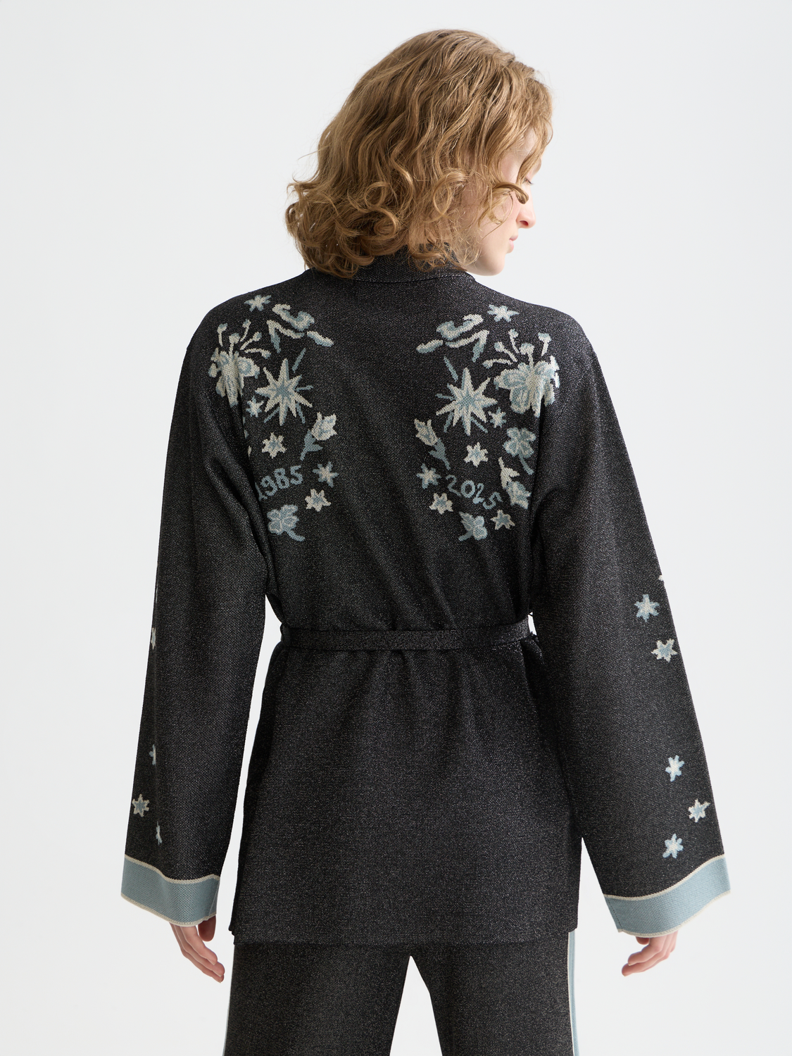 Scotch & Soda Jacquard knitted jacket in stylish knitwear with intricate patterns, shown from the back.