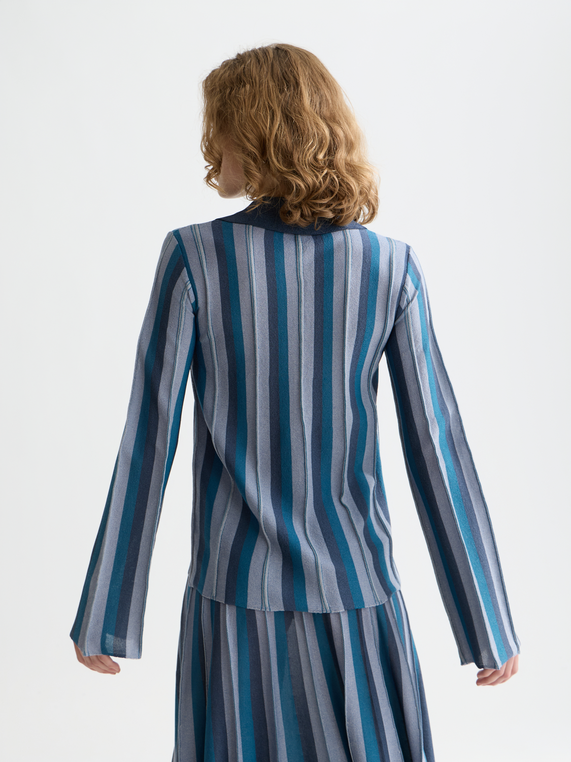 Scotch & Soda collared knit cardigan with button closure, featuring a classic design and ribbed cuffs viewed from the back.