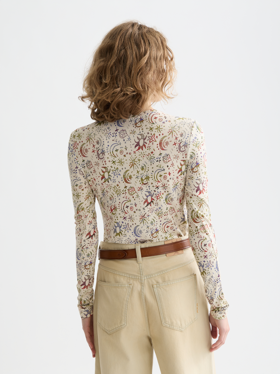 Printed long sleeve T-shirt by Scotch & Soda featuring a stylish design, shown from the back with vibrant artwork and casual fit.