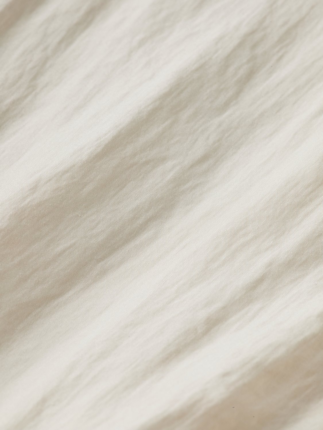 Long sleeve wrap shirt from Scotch & Soda featuring a stylish design and soft fabric, shown in a close-up view.