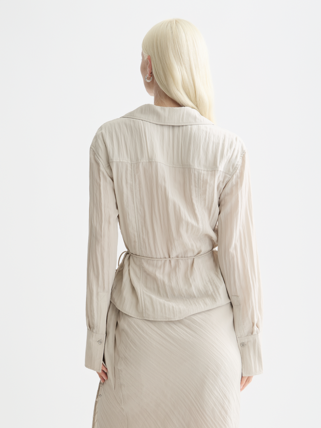 Long sleeve wrap shirt by Scotch & Soda featuring a fitted silhouette and back design, shown in a front view.