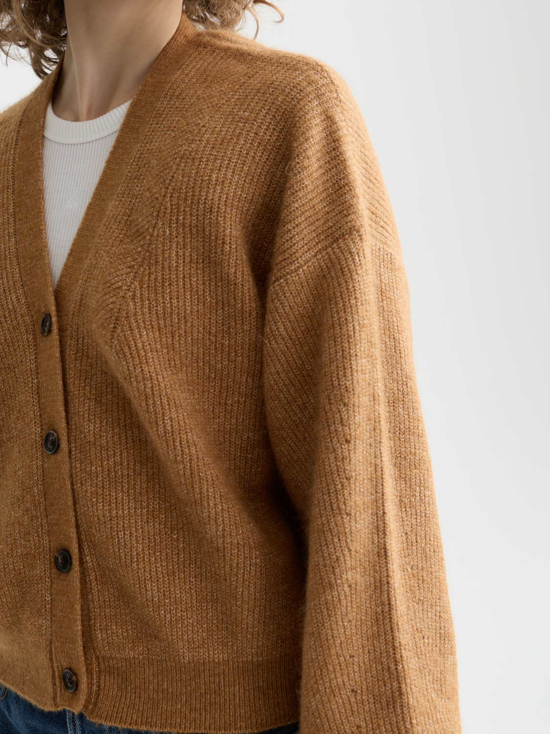 Fuzzy knit cardigan by Scotch & Soda featuring soft texture and cozy design, displayed on a neutral background.