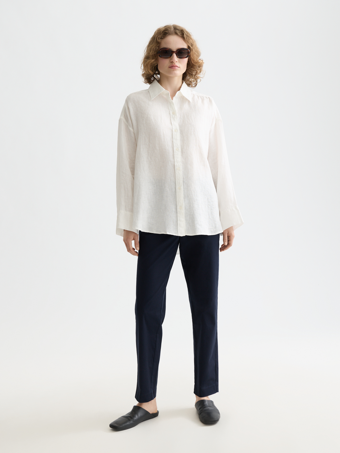 Long-sleeve linen shirt by Scotch & Soda featuring a lightweight, breathable fabric and classic fit, displayed on a model.