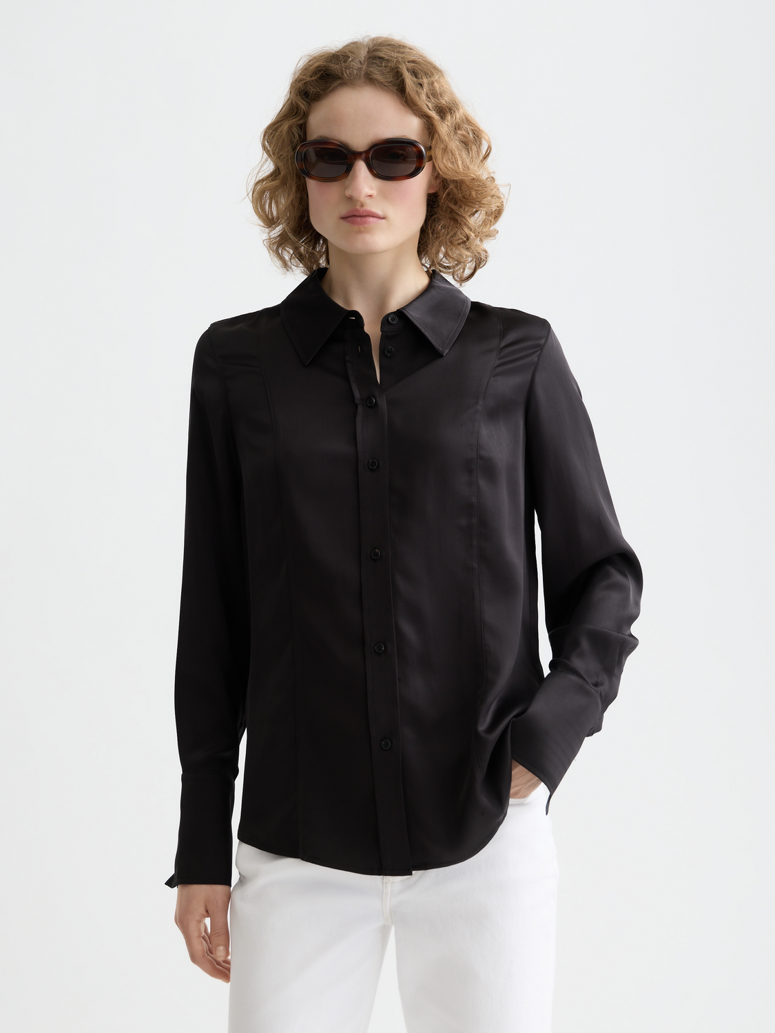 Long-sleeve satin shirt by Scotch & Soda, featuring a smooth, shiny fabric and classic collar, displayed on a hanger.