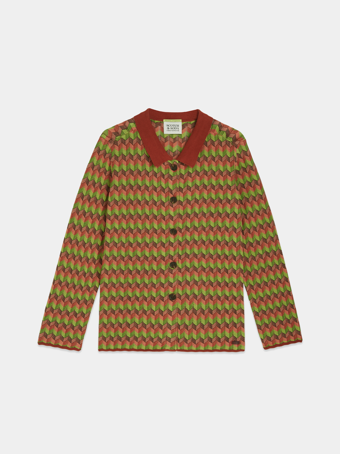 SCOTCH & SODA jacquard knitted jacket, close-up of the textured knitwear fabric with intricate patterns and a fitted style.