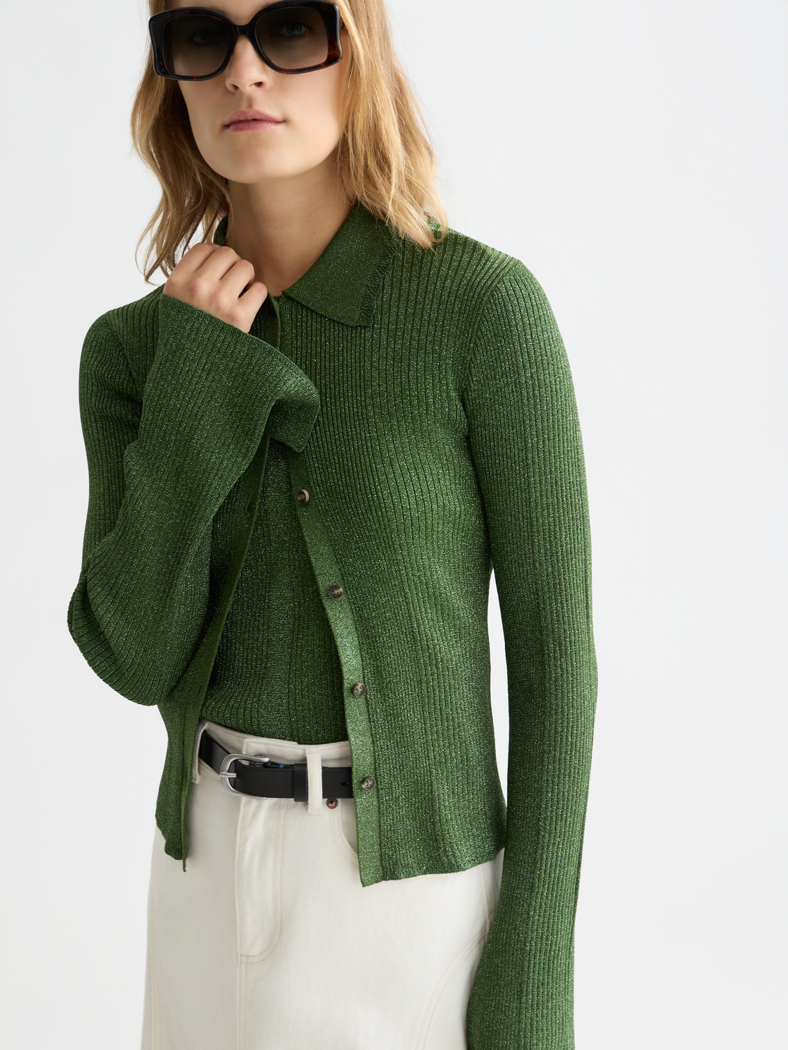 Metallic ribbed cardigan from Scotch & Soda featuring a stylish knitwear design with a metallic sheen and textured ribbing.