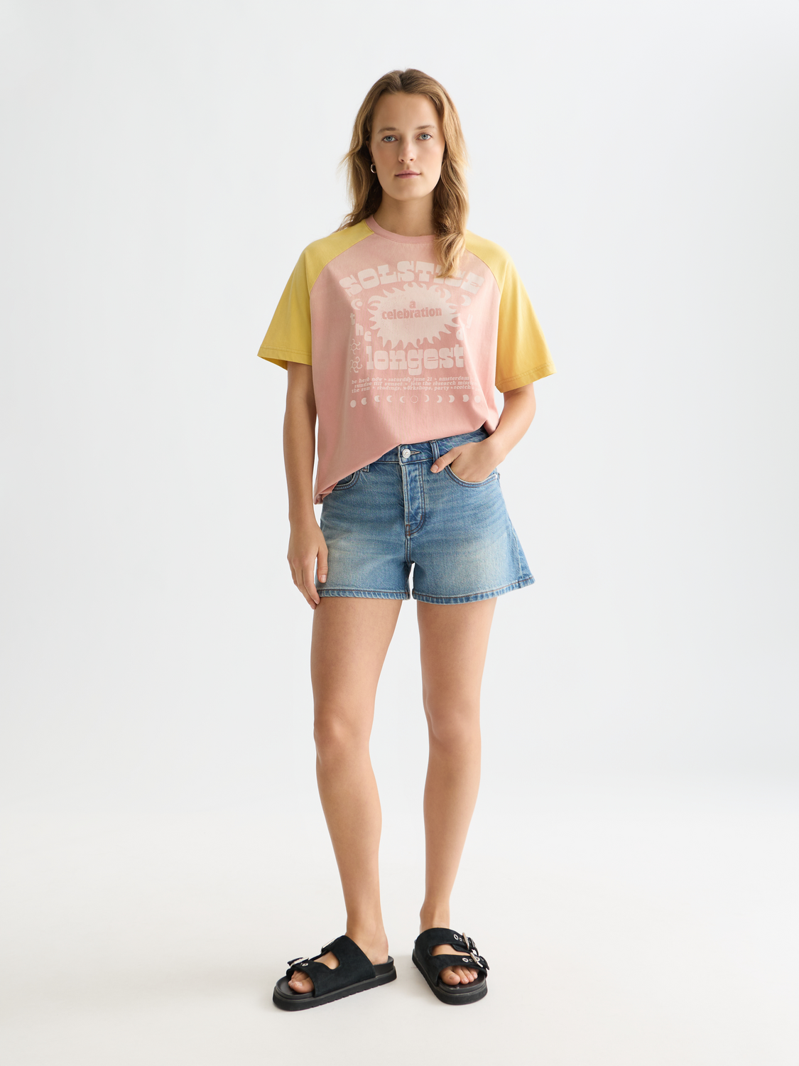 Scotch & Soda raglan artwork t-shirt with short sleeves, featuring colorful graphic design on front.