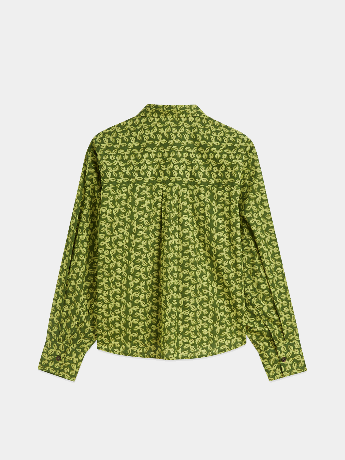 Long-sleeve printed shirt by Scotch & Soda featuring vibrant patterns and a relaxed fit, displayed on a hanger.
