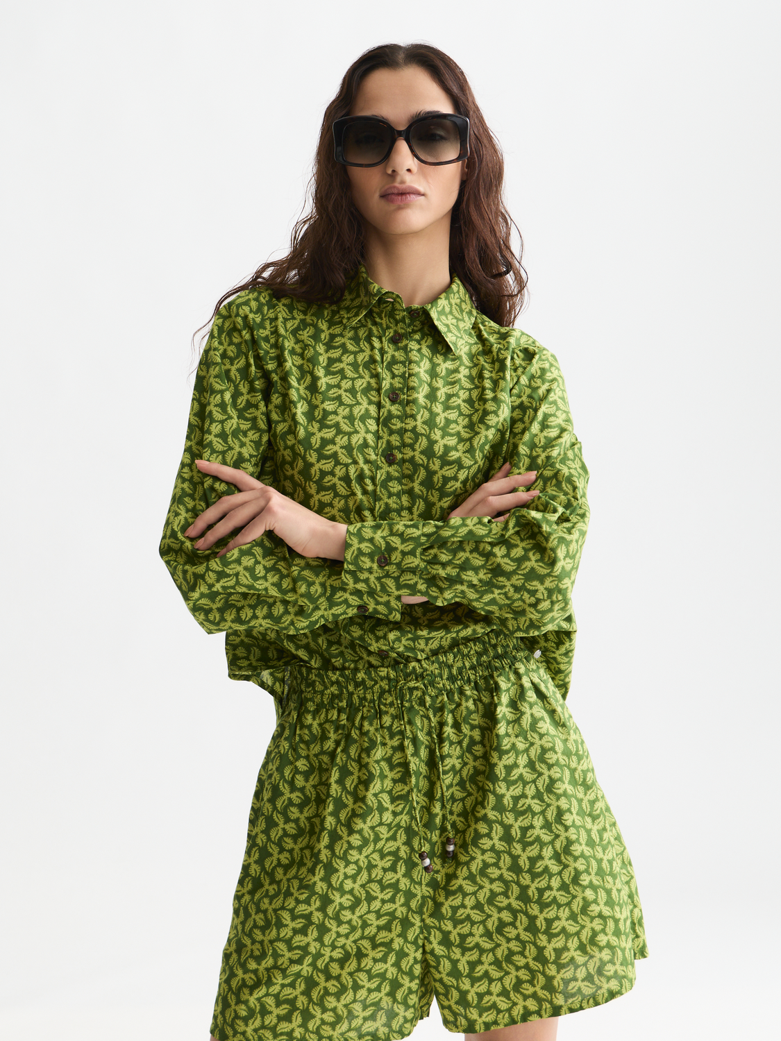 Long sleeve printed shirt by Scotch & Soda featuring colorful floral patterns on soft fabric.