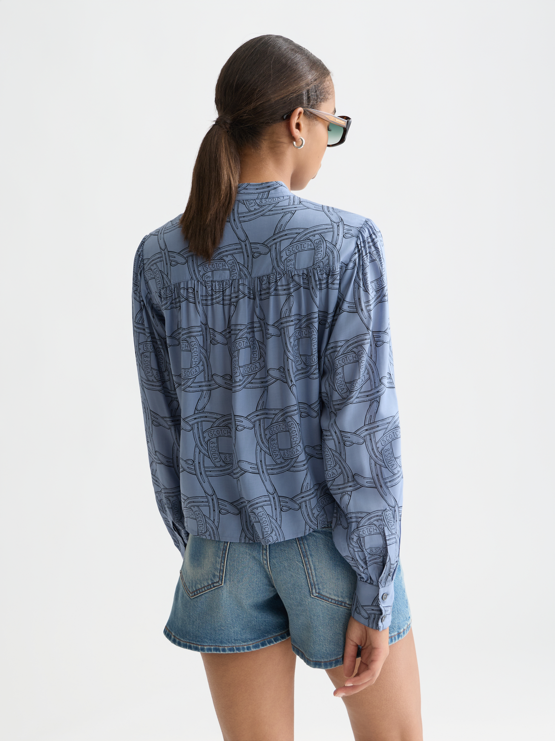 Long-sleeve Scotch & Soda pintuck shirt with front button closures and a tailored fit, shown from the back view.