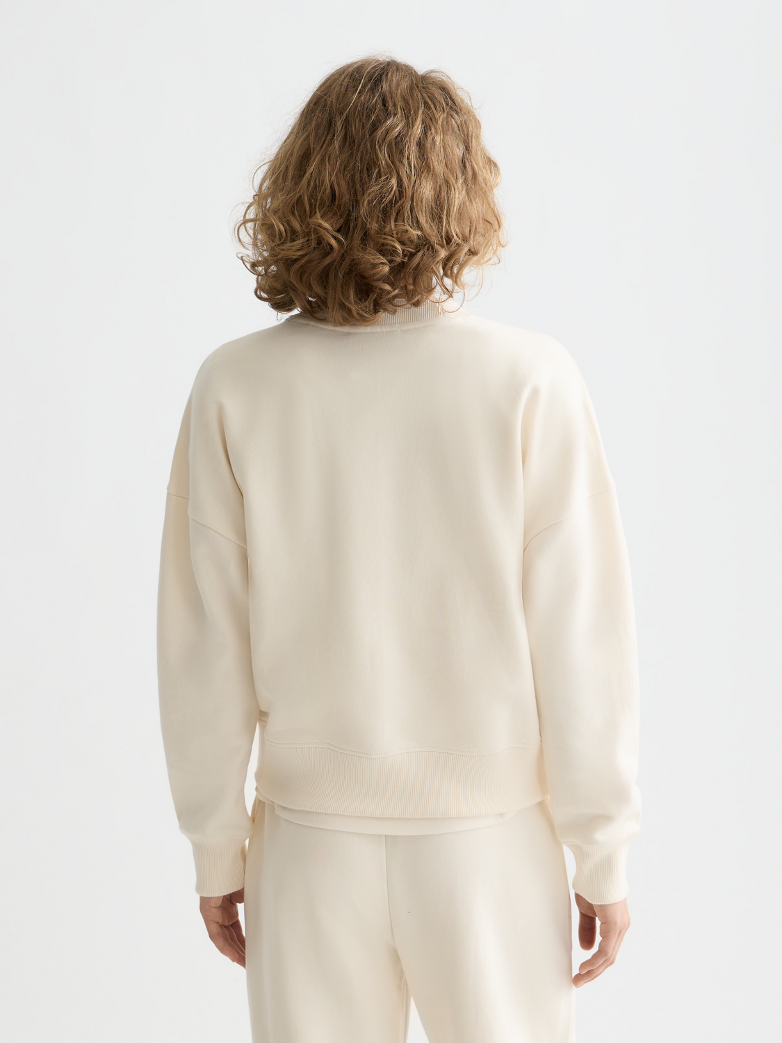 Black Scotch & Soda logo sweatshirt with a relaxed fit, featuring a prominent brand logo on the front and comfortable cotton material.