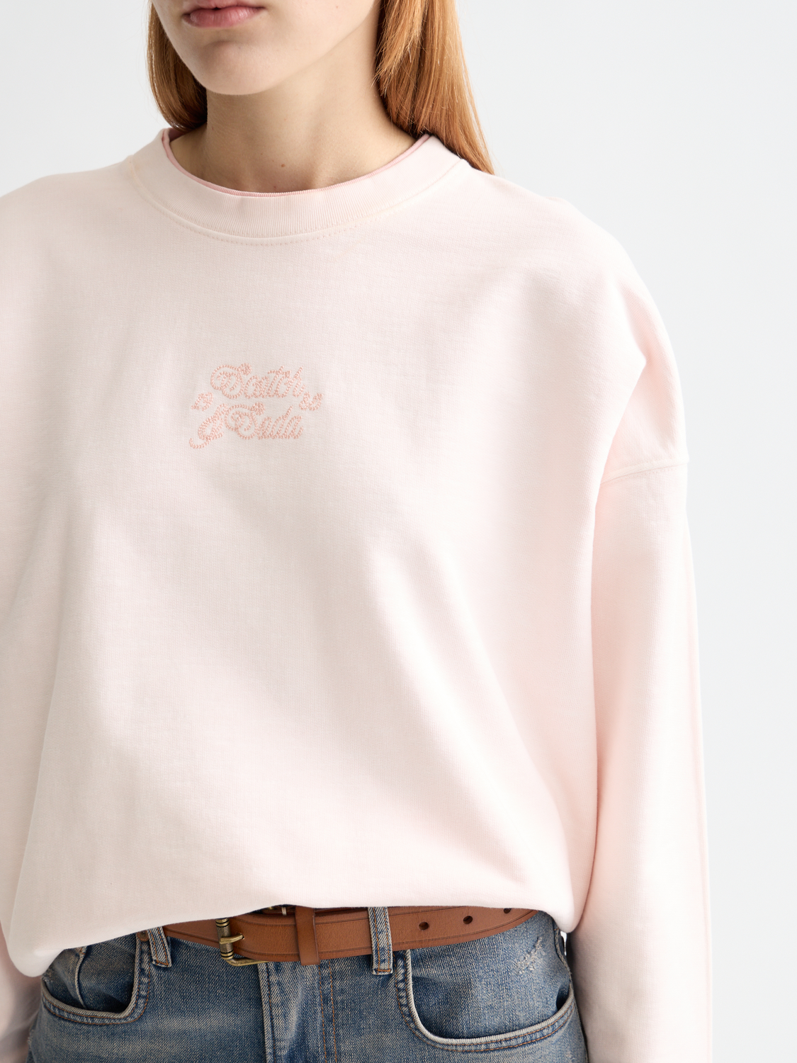 Oversized sweatshirt by Scotch & Soda with logo design, soft fabric, and relaxed fit, shown on a model.
