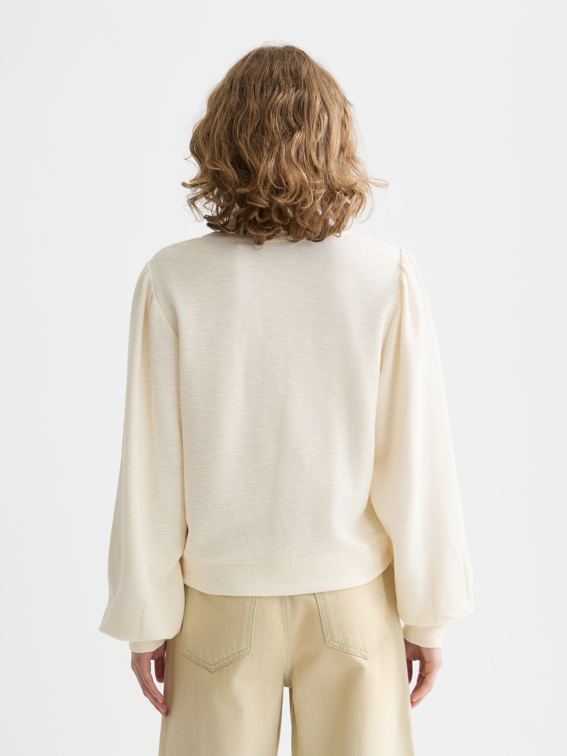 SCOTCH & SODA sweatshirt with placket ties, showing the back view of the casual sweat with detailed neckline design.