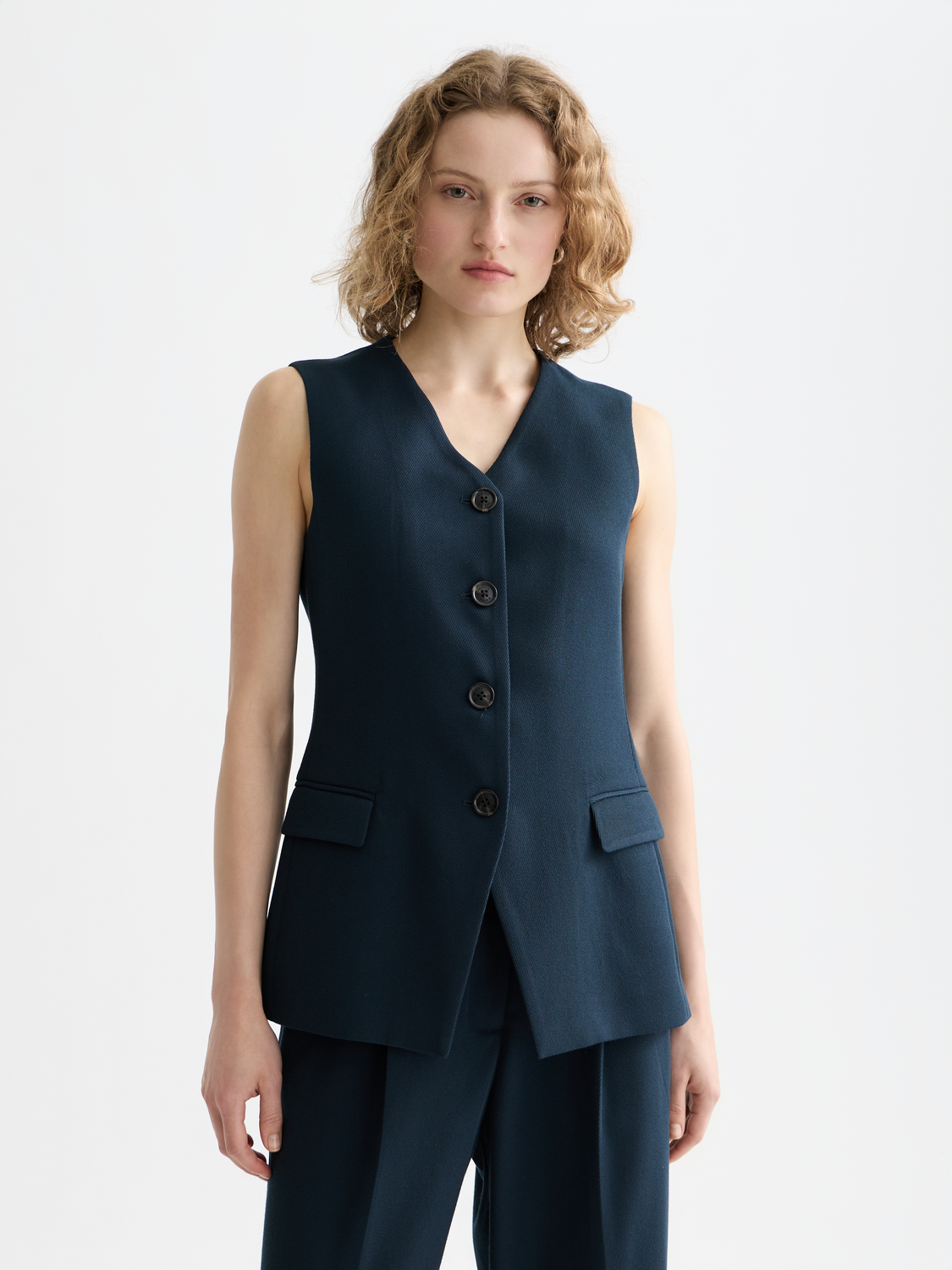 Tailored Scotch & Soda gilet in dark fabric, front view showing structured design and sleek fit, ideal for smart casual wear.