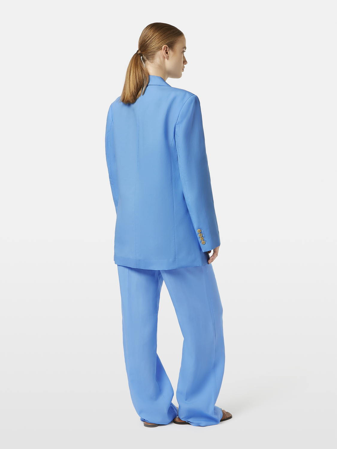 Boyfriend-fit blazer by Scotch & Soda, tailored silhouette with classic lapels and structured design, shown in navy fabric.