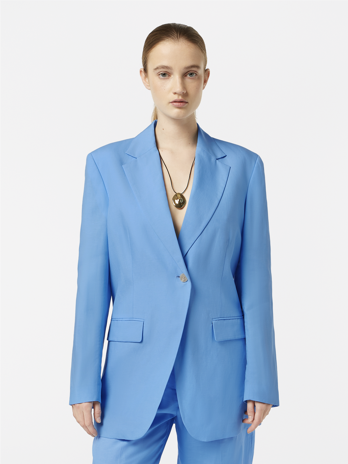 Boyfriend-fit blazer by Scotch & Soda in a classic tailored design, shown in a neutral color with lapel collar and front pockets.