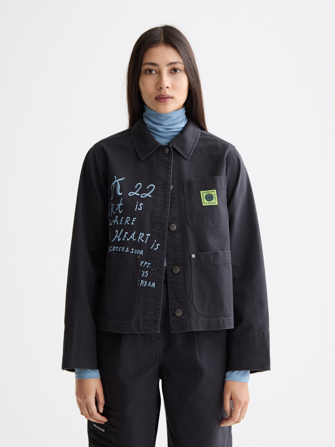 Washed workwear jacket by Scotch & Soda featuring durable fabric, front pockets, and a casual fit suitable for work or casual wear.