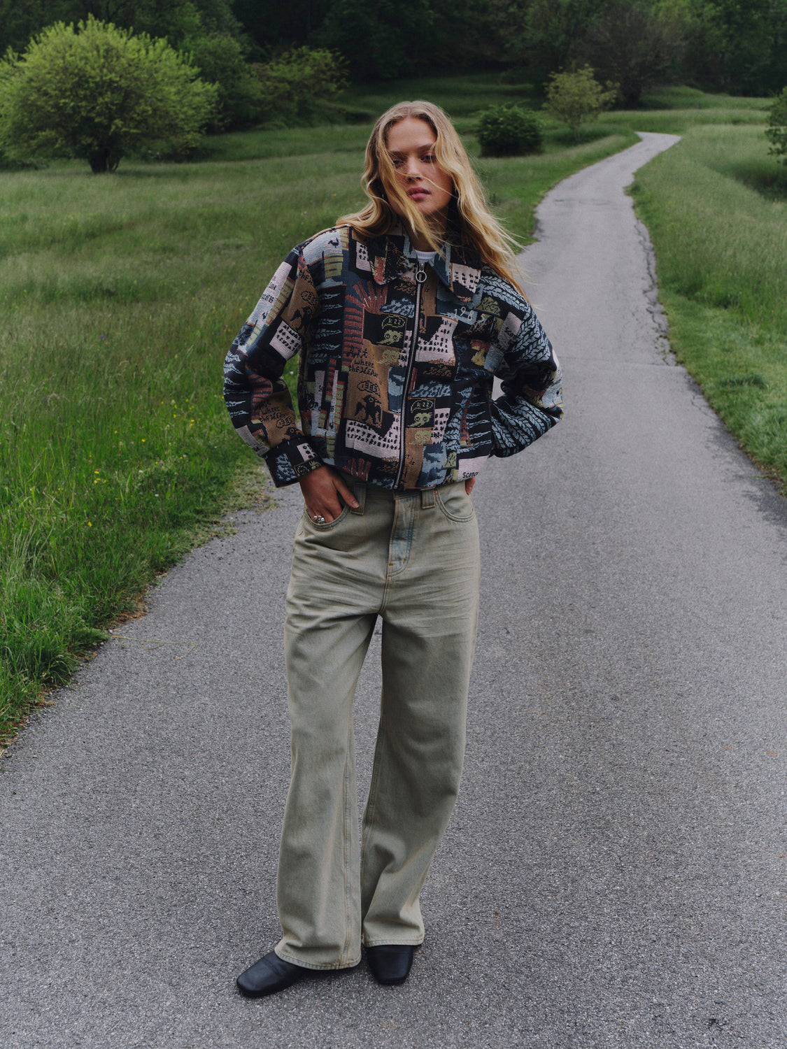 Scotch & Soda jacquard jacket featuring intricate woven patterns in stylish design, shown on a model.