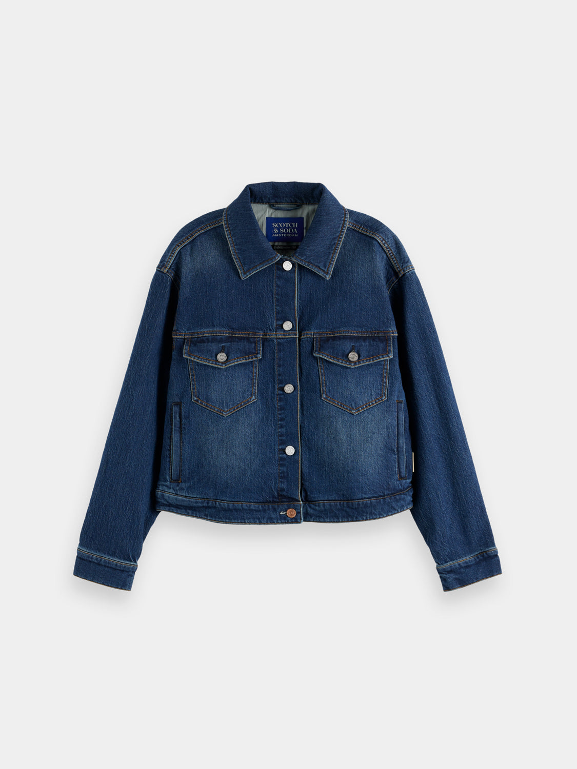 Light blue cropped denim jacket by Scotch & Soda with long sleeves and button front, styled on a hanger.