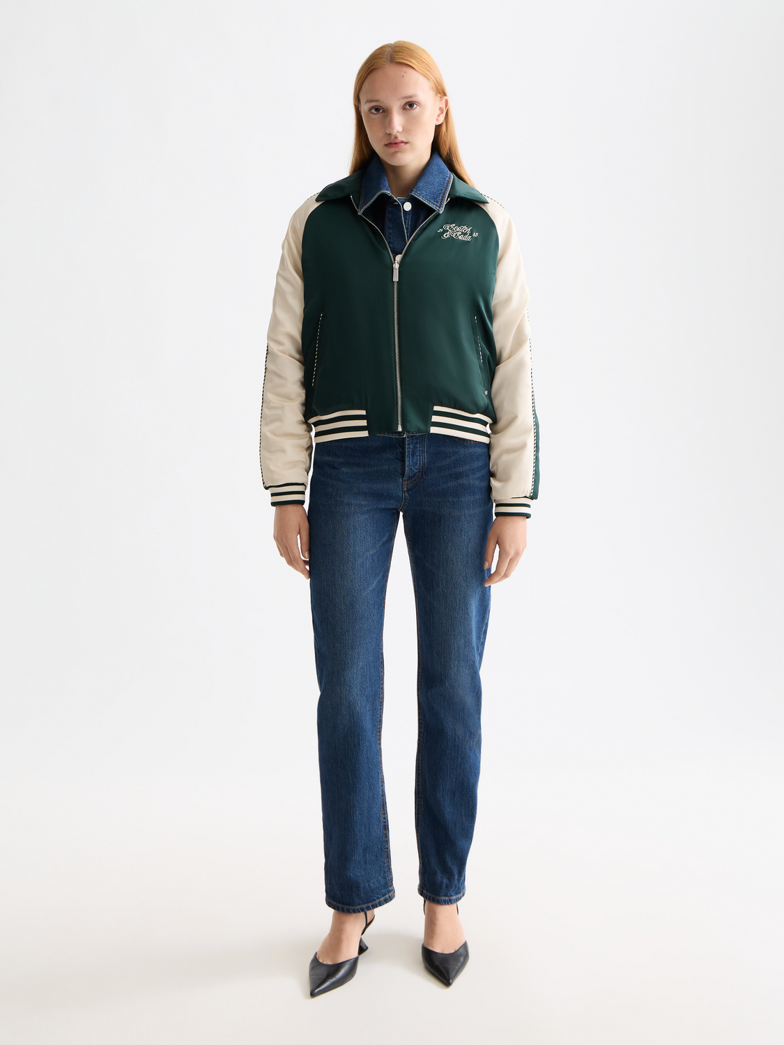 Reversible souvenir jacket by Scotch & Soda showing vibrant patterns on both sides, with a classic collar and snap buttons.