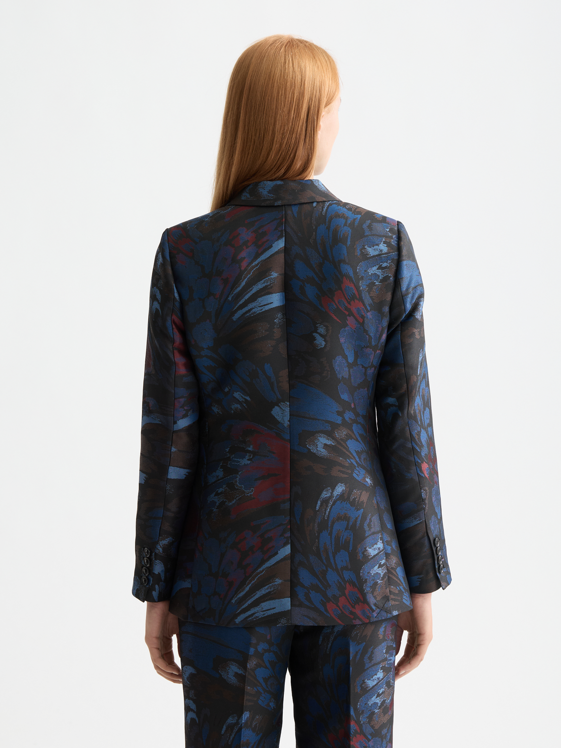 Dark navy Scotch & Soda Jacquard blazer with a tailored fit, featuring intricate woven pattern and classic lapel design.