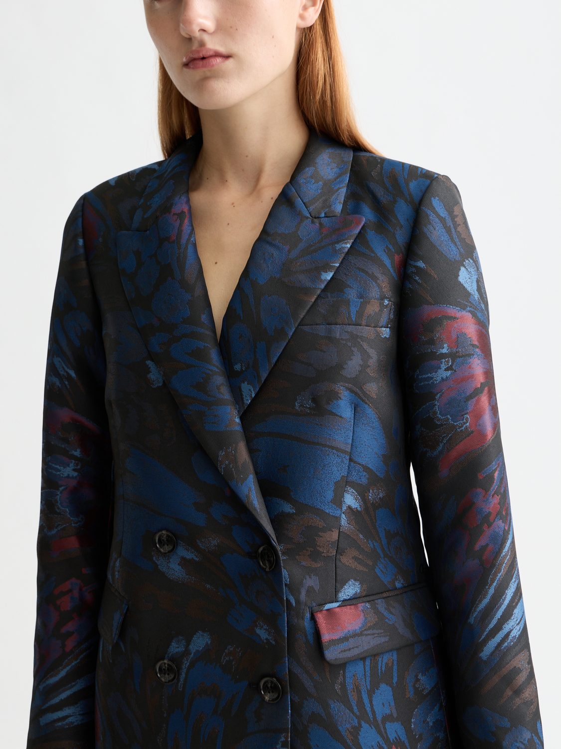 Scotch & Soda jacquard blazer featuring intricate woven pattern, tailored fit, and classic lapel design on model.